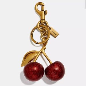 Coach cherry charm
